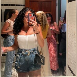 White Corset Top and Denim Shorts